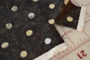 Make cut into the selvage edge of fabric